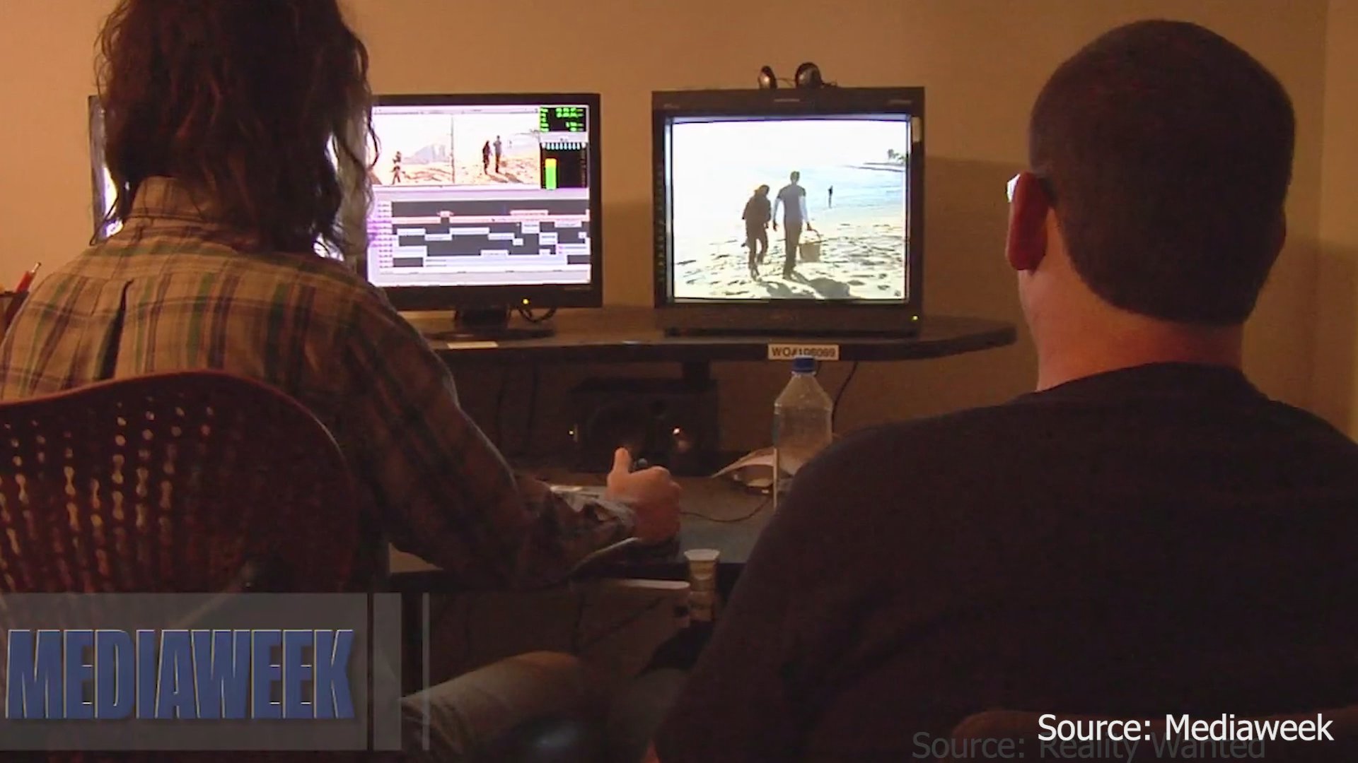 An interviewer conducts a professional dialogue with a subject about television production, followed by a sequence showing editors working at computer stations on digital content.