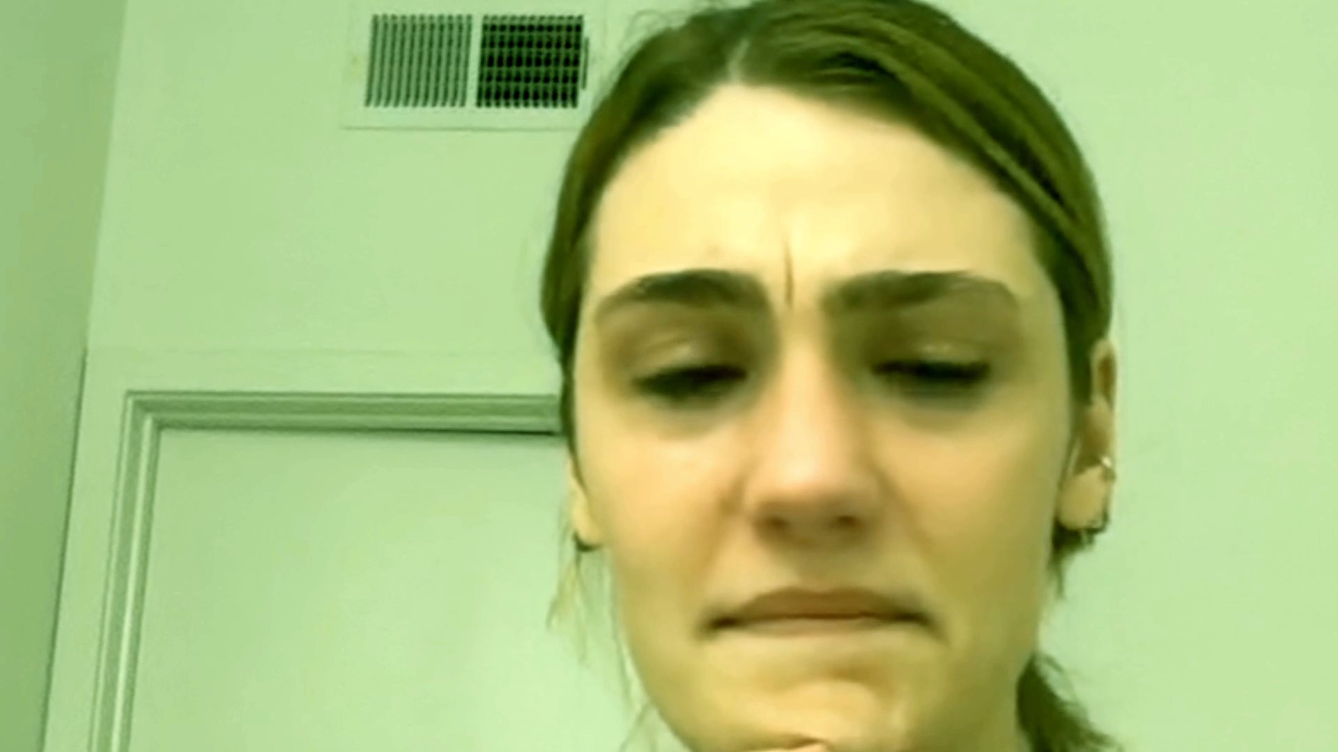 A woman shares an emotional and vulnerable reflection while visibly crying, conveying deep personal distress.