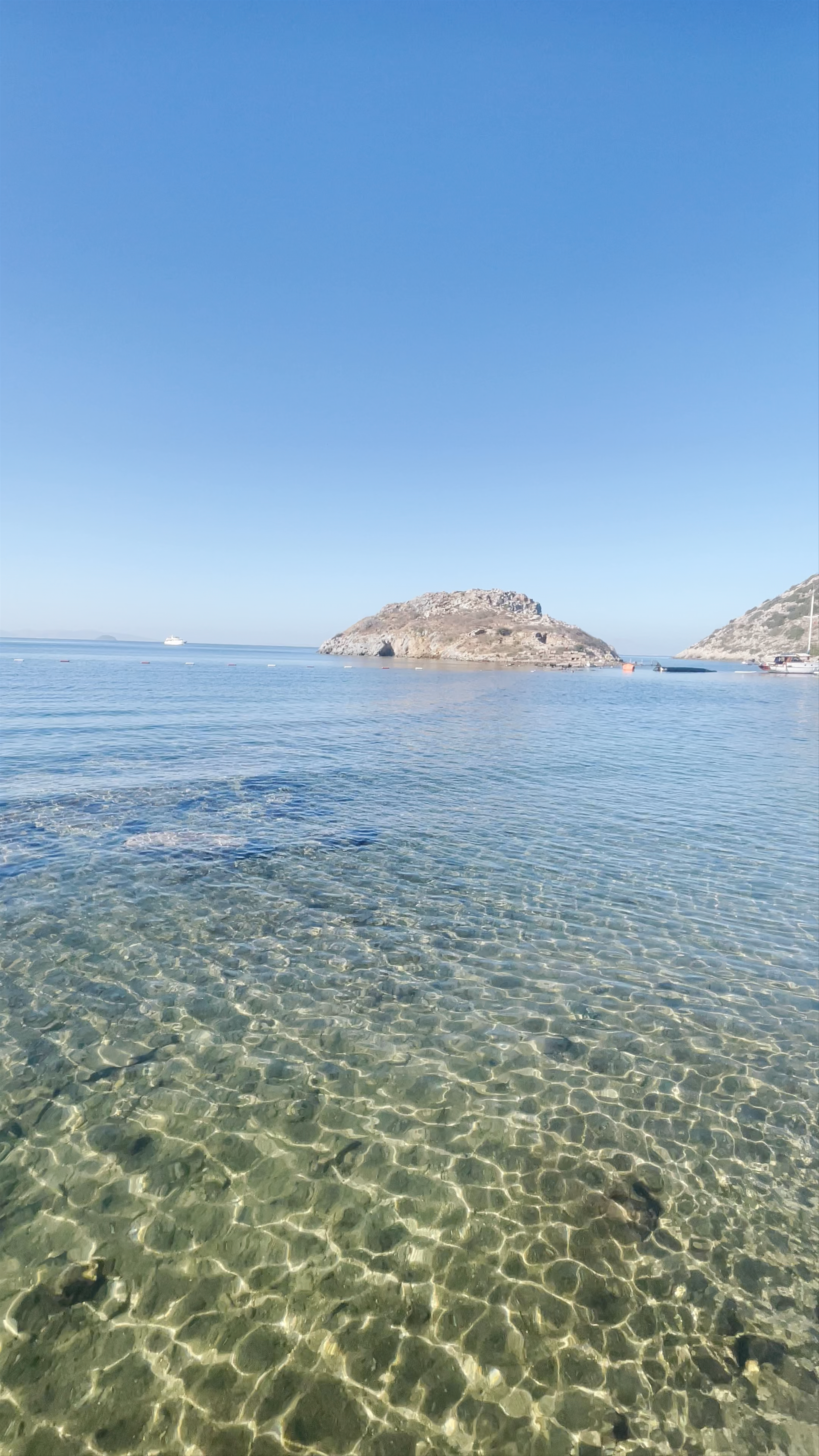 Crystal Clear Waters at Gümüşlük Halk Plajı, Bodrum