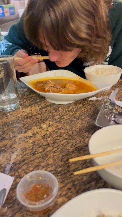 Mapow Sushi-Thai Restaurant - my buddy eating the soup with chopsticks for fun (they gave us spoons, this was just to make me laugh) - Thai Near Me - Salisbury, Massachusetts