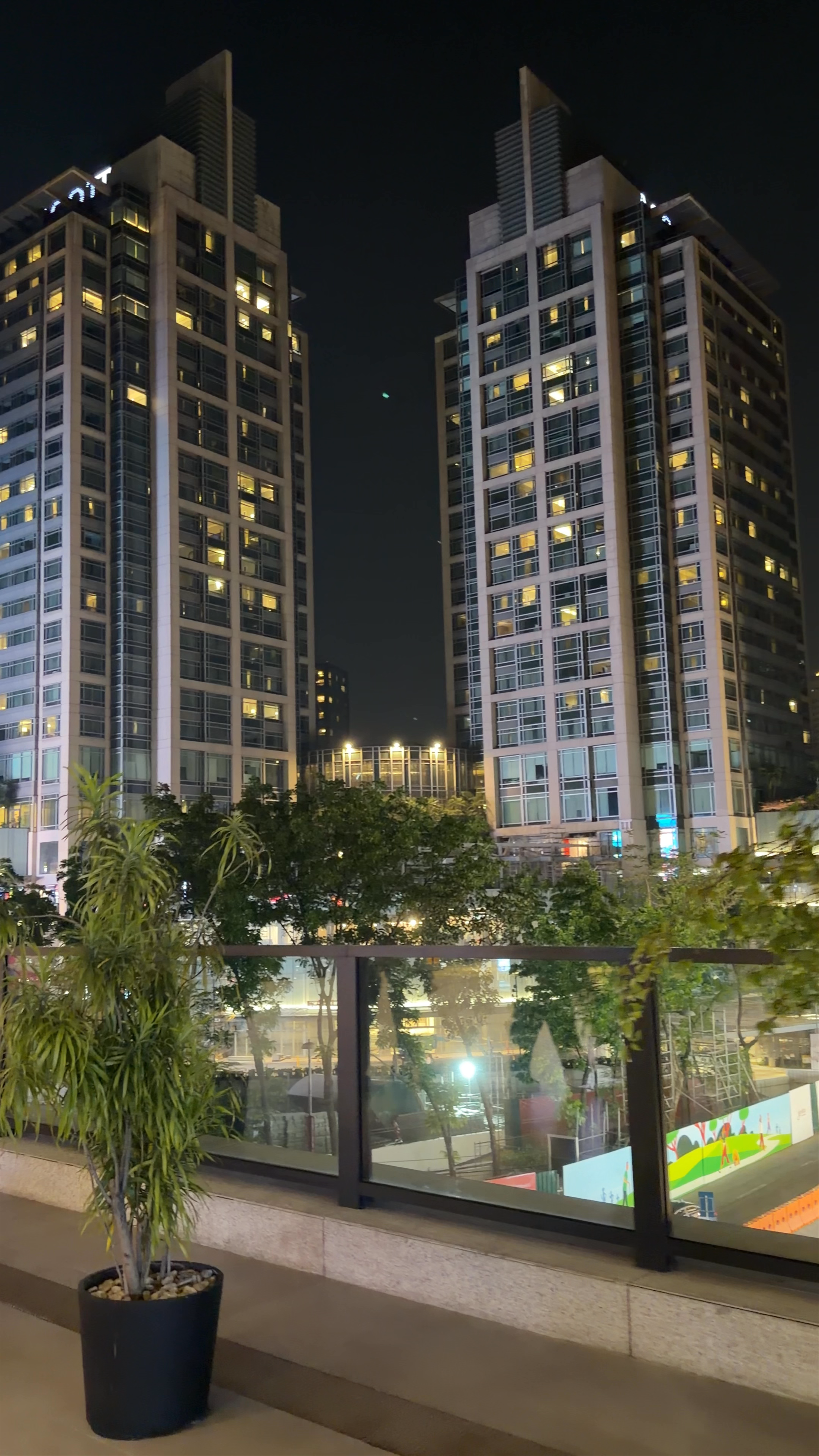 Glorietta 5 at Night: Urban Lights and Vibrant Life in Makati City