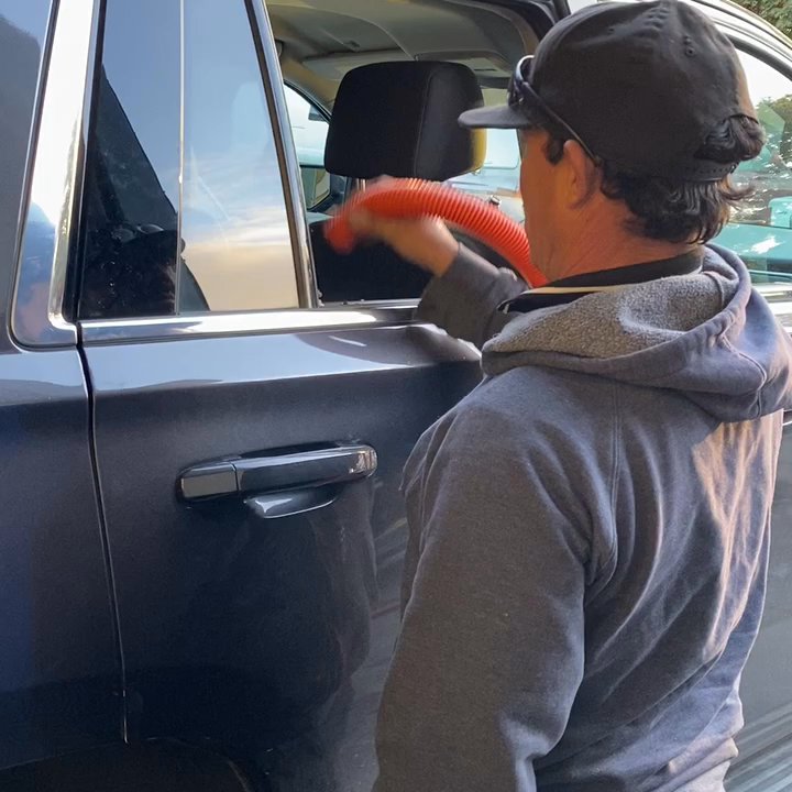 Auto Glass Force - Theft and vandalized broken car glass vacuumed by Auto Glass Force Tech - Auto Glass Services Near Me