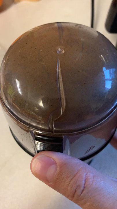 Ampersand Cafe - Grinding the coffee beans - Coffee & Tea Near Me - Seattle, Washington
