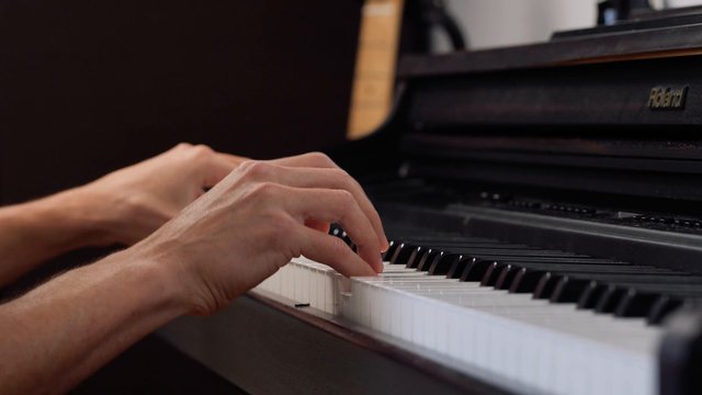 Musician playing the piano