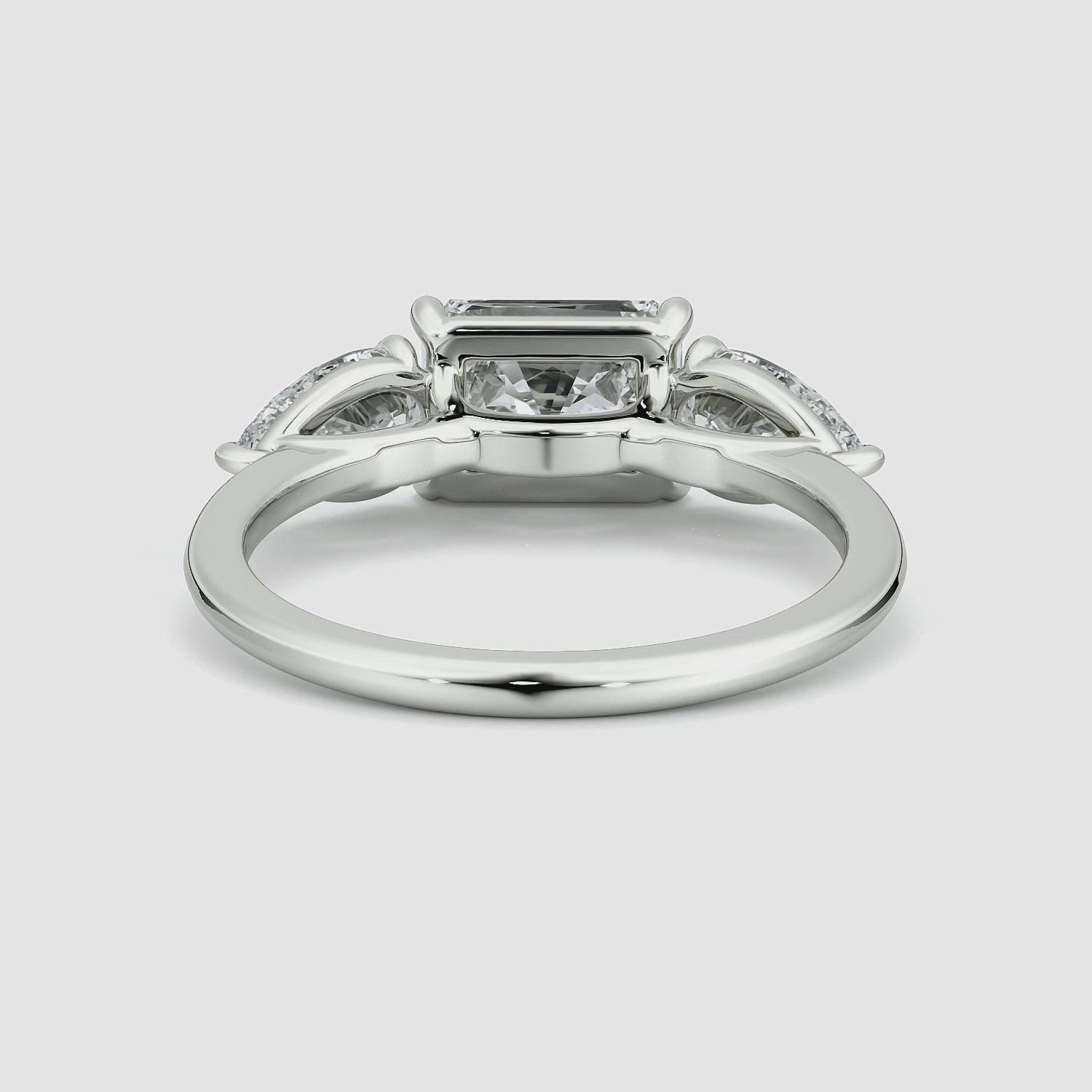 The Three Stone | Radiant | Platinum | bandAccent: Plain | diamondOrientation: horizontal | sideStoneCarat: 0.50ct | sideStoneShape: Pear | caratWeight: other