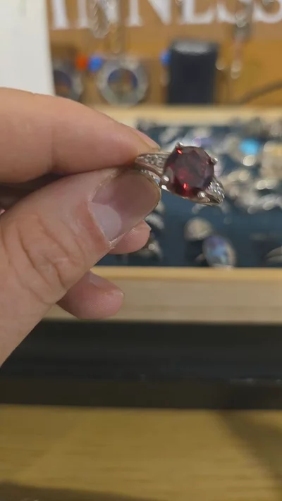 £24).  925 sterling Silver Ring With Red Gemstone And Side Diamonds image 1