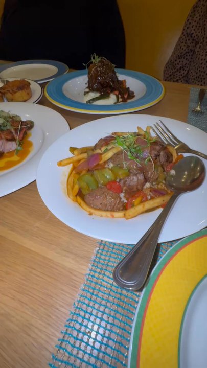 Bocanova - Lomo Saltado , pork chops and beef rib. THE CORN BREAD yummy - Latin American Near Me - Oakland, California