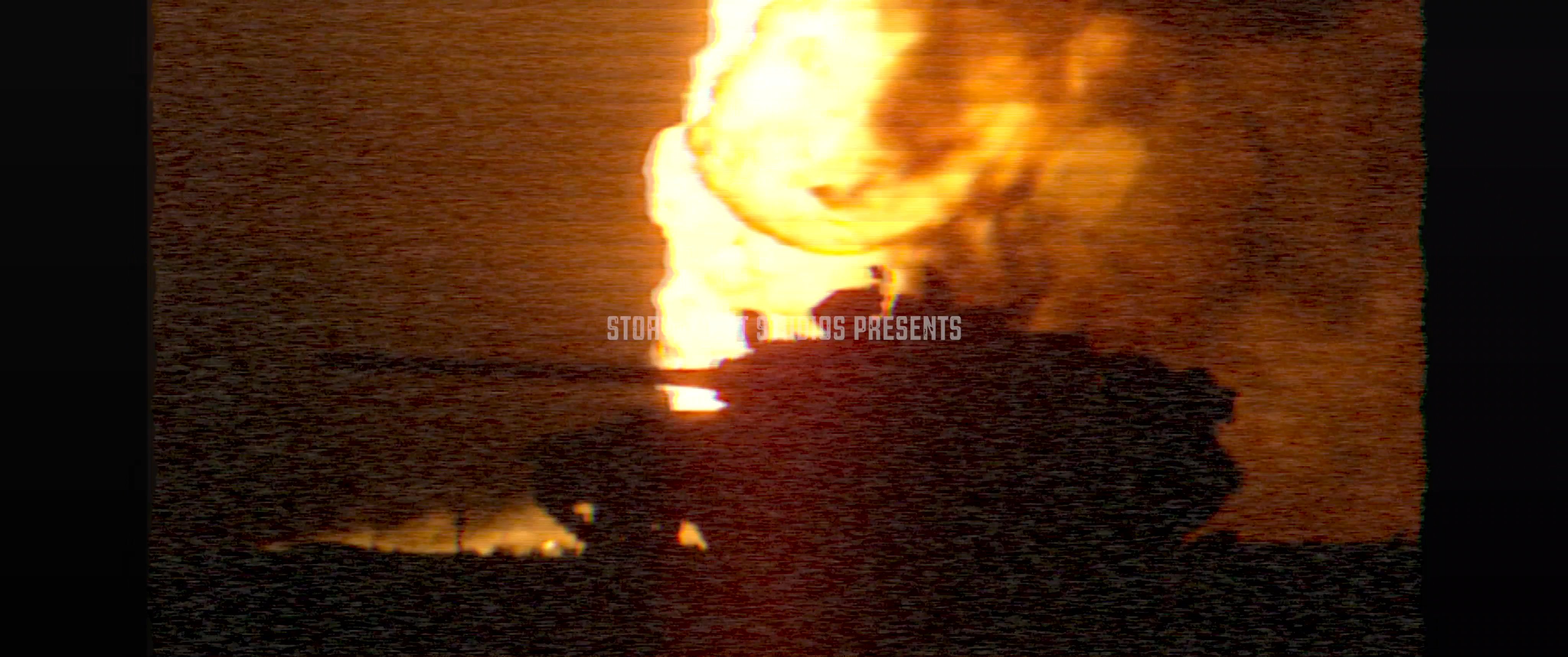 A documentary title sequence explores the etymology of the word radical while displaying archival military tank footage with aged, distressed visual effects.