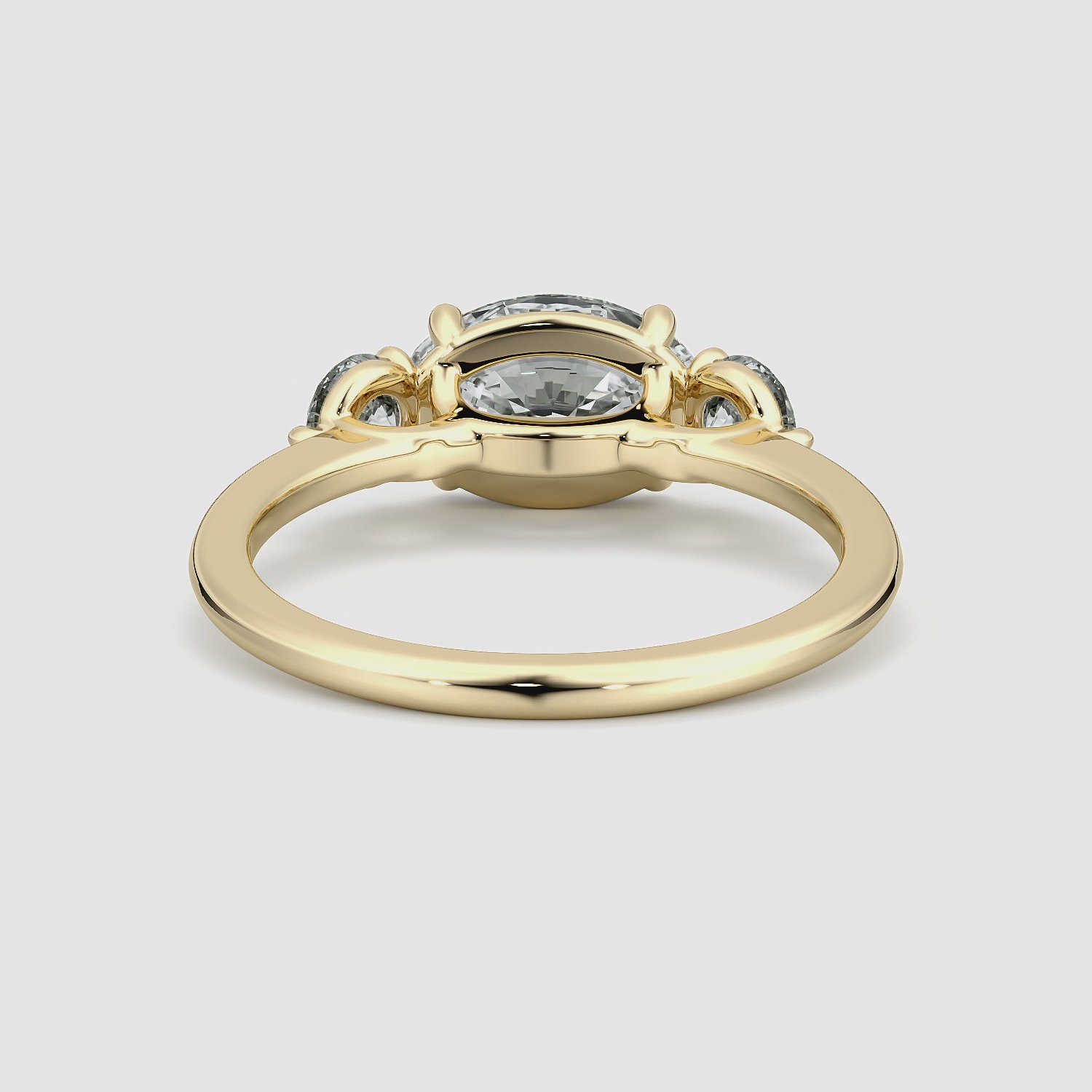 The Three Stone | Oval | 18k | Yellow Gold | bandAccent: Plain | diamondOrientation: horizontal | sideStoneCarat: 0.25ct | sideStoneShape: Round Brilliant | caratWeight: other