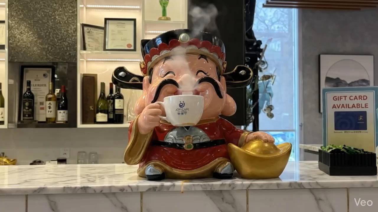 JOY Cafe - 財神爺 is enjoying a cup of HK style hot tea during his coffee break. - Cafes Near Me - Vancouver, British Columbia