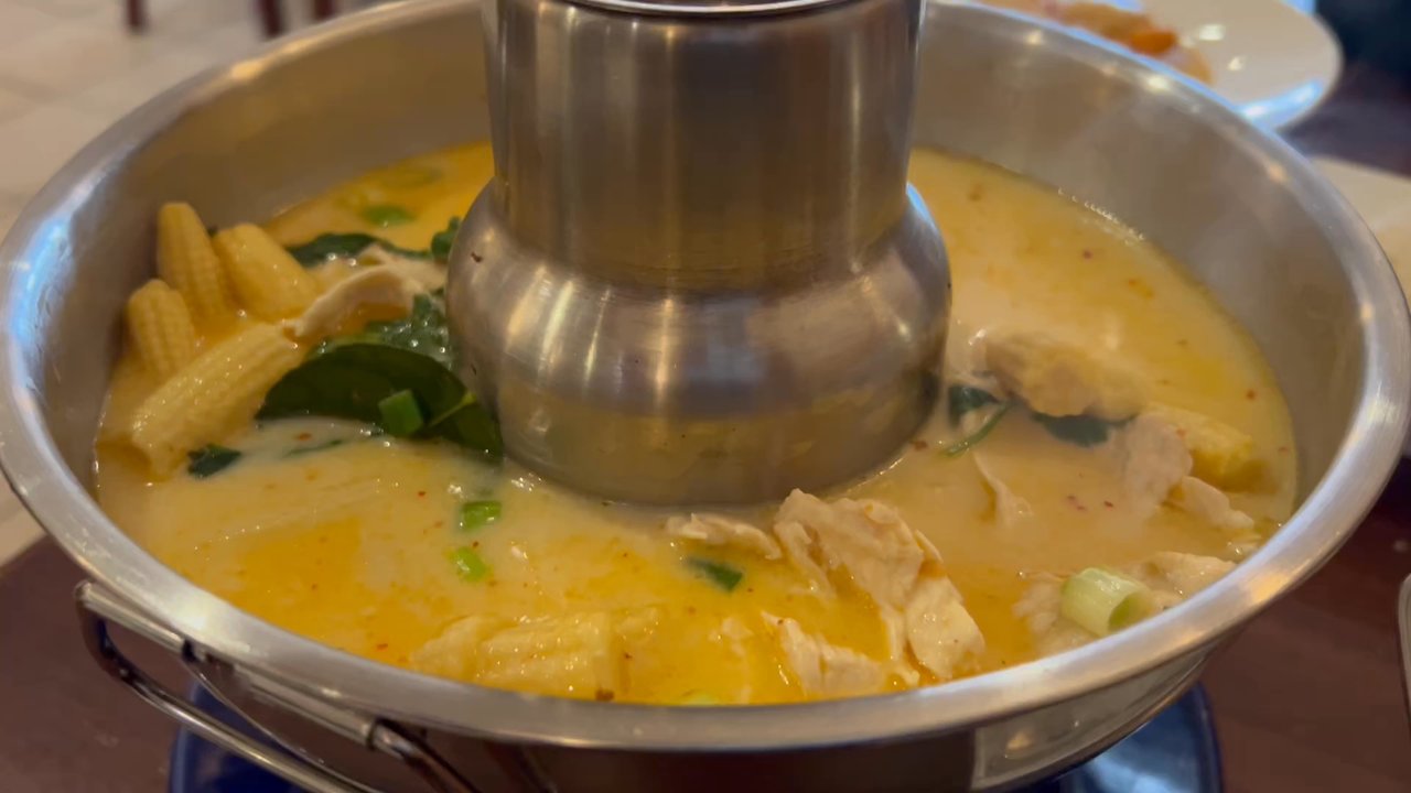 Thai Charm Cuisine - A small fire is lit under the Bowl to get the soup very warm and deepen the flavors - Thai Near Me - Haltom City, Texas