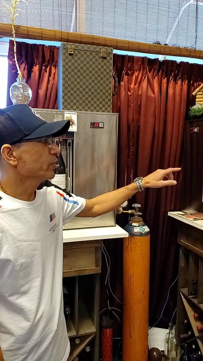 Niko's Wine Corner - Mr. Niko explaining the different types of wines and coolers. He's very knowledgeable of all types of wines. - Wine Bars Near Me - Snellville, Georgia