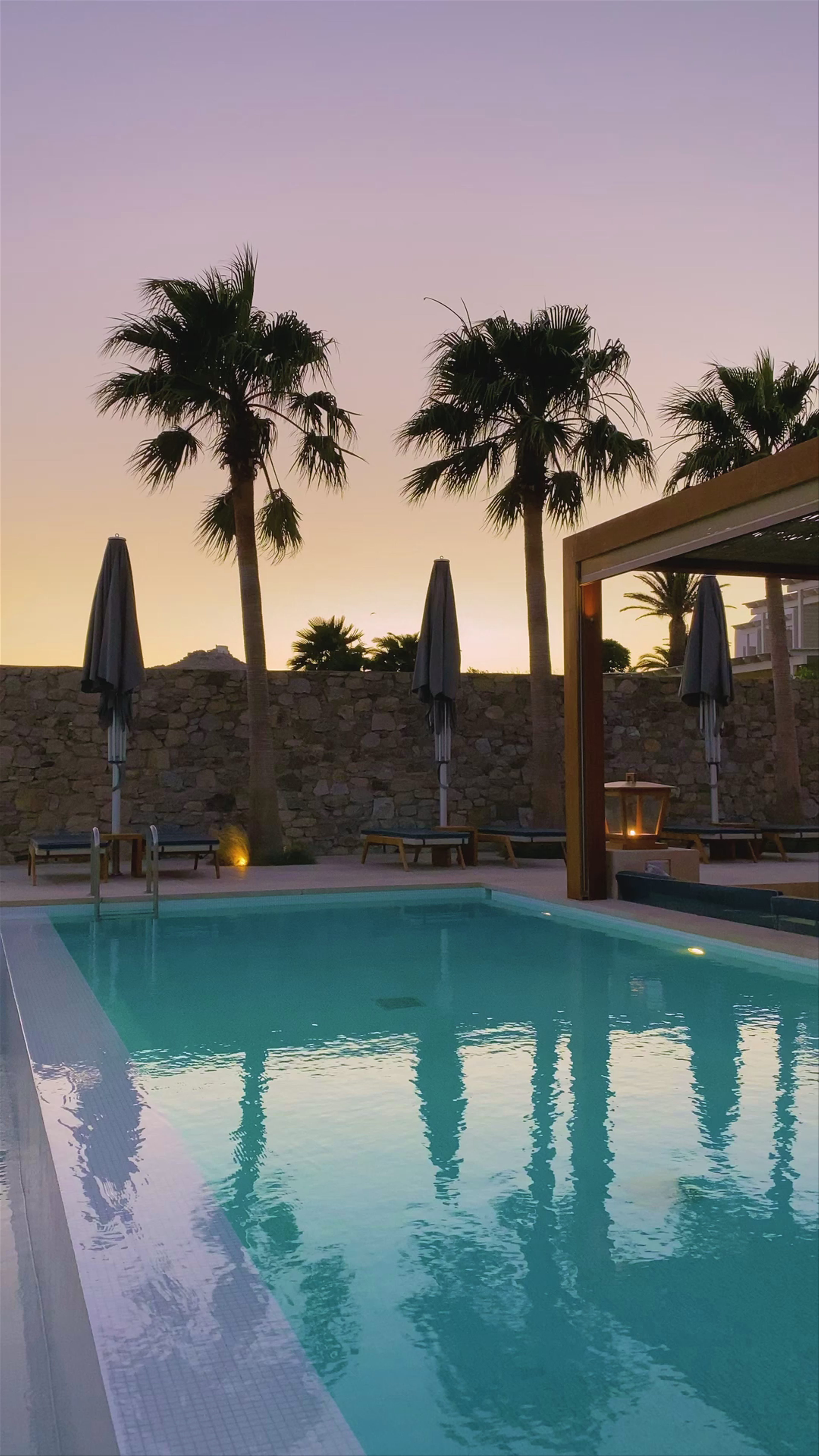 Sunset Serenity at a Luxurious Poolside in Ornos, Mykonos