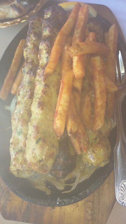 Shalimar Grill - Sizzling chicken sheekh kebab platter. - Pakistani Near Me - Toronto, Ontario