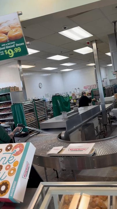 Krispy Kreme - First time seeing how they clean the icing. Fascinating. - Coffee & Tea Near Me - Seattle, Washington