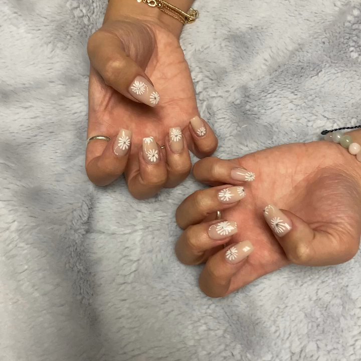 Allure Nails - Nude dip powder with hand painted daisies - Nail Salons Near Me - Irving, Texas
