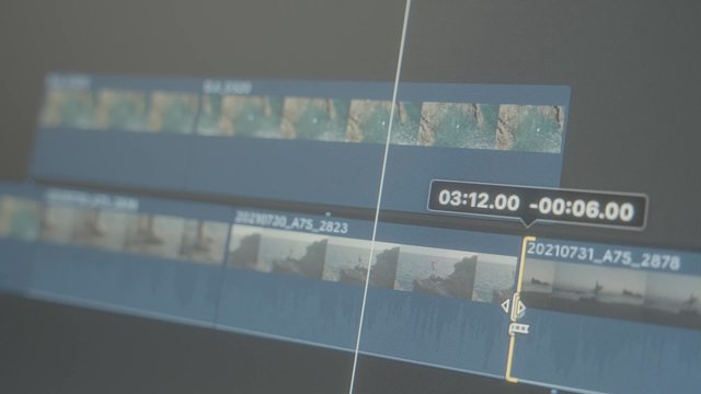 A video cutting process is shown on screen