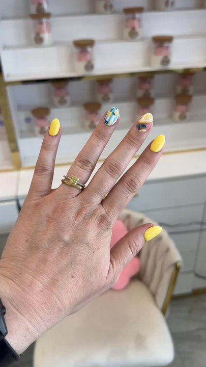 Imperial Aura Nails and Spa - Almond shaped yellow, lemon design. - Waxing Near Me - Bakersfield, California