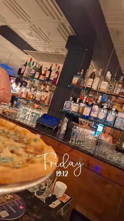 Birroteca Baltimore - Sitting at the bar deciding on a cocktail - Italian Near Me - Baltimore, Maryland