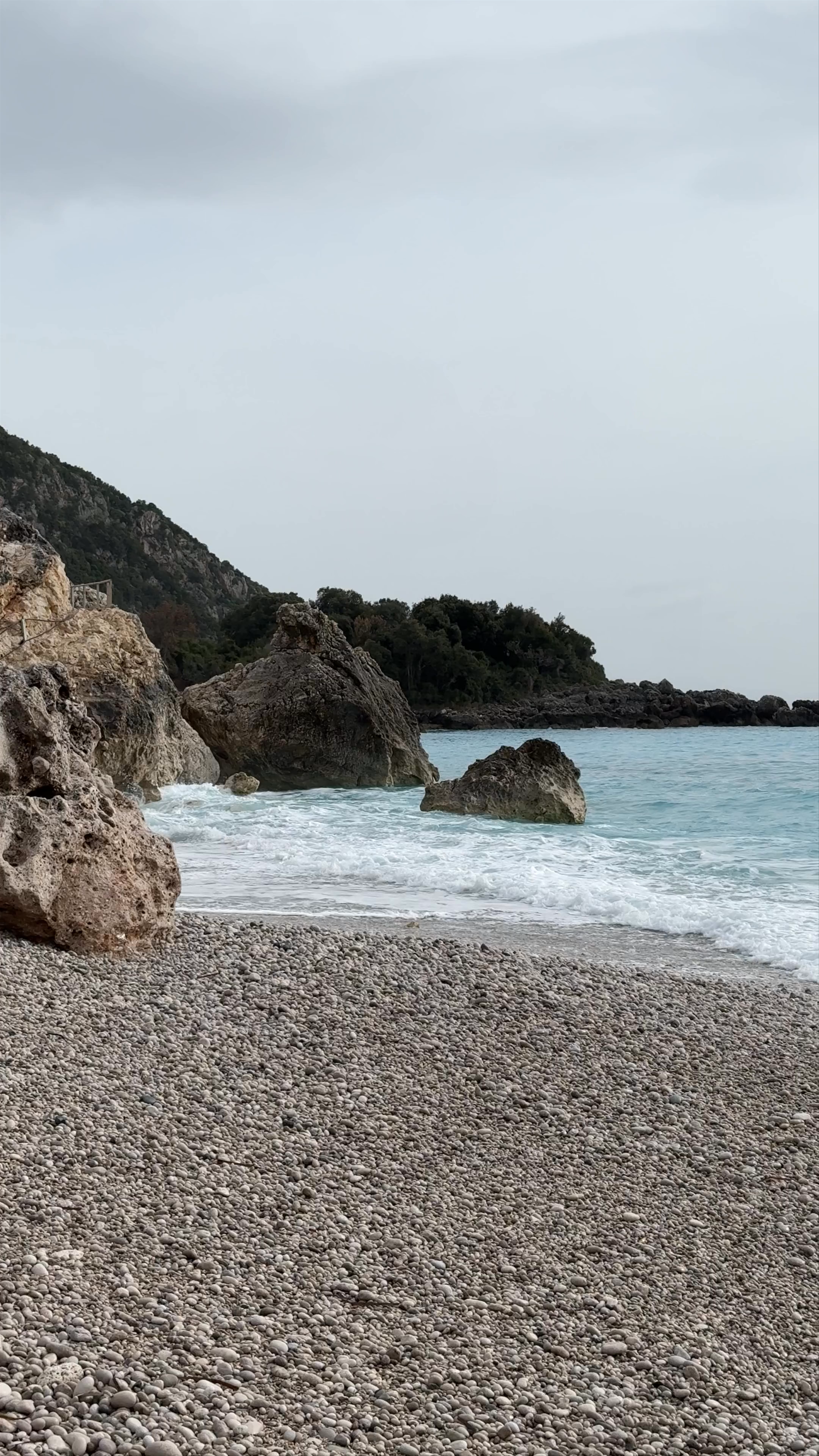 Tranquil Pebble Shores of Dhërmiu Beach, Albania