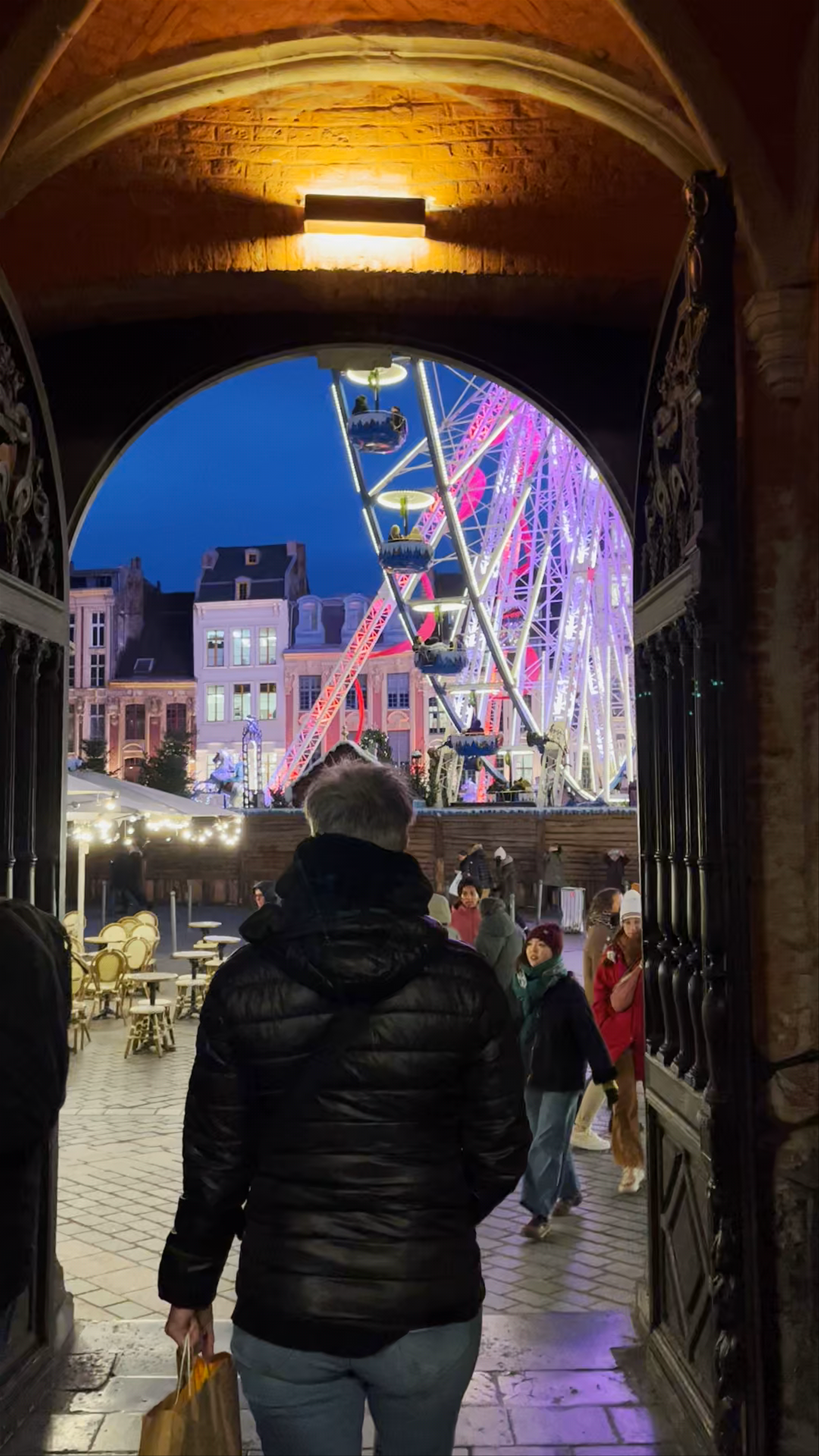Festive Winter Evening at Lille’s Grand Place with Illuminated Ferris Wheel
