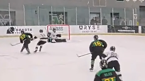 Ian Boudreault: Calmly pausing before the rebound shot at TAC.