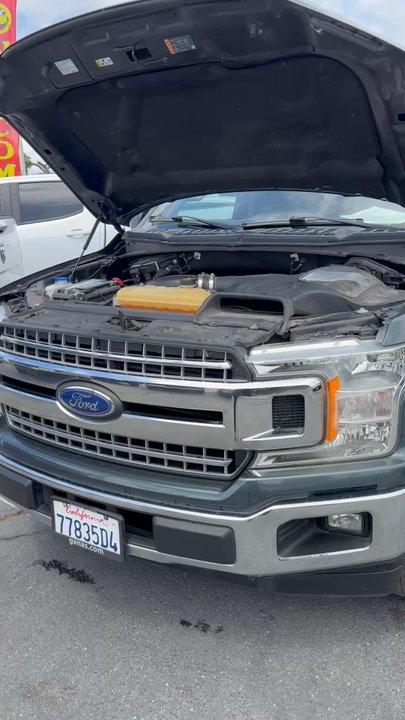 Pro Fix Go - Zhenya doing a very thorough inspection on this Ford F150 - Auto Repair Near Me - Perris, California