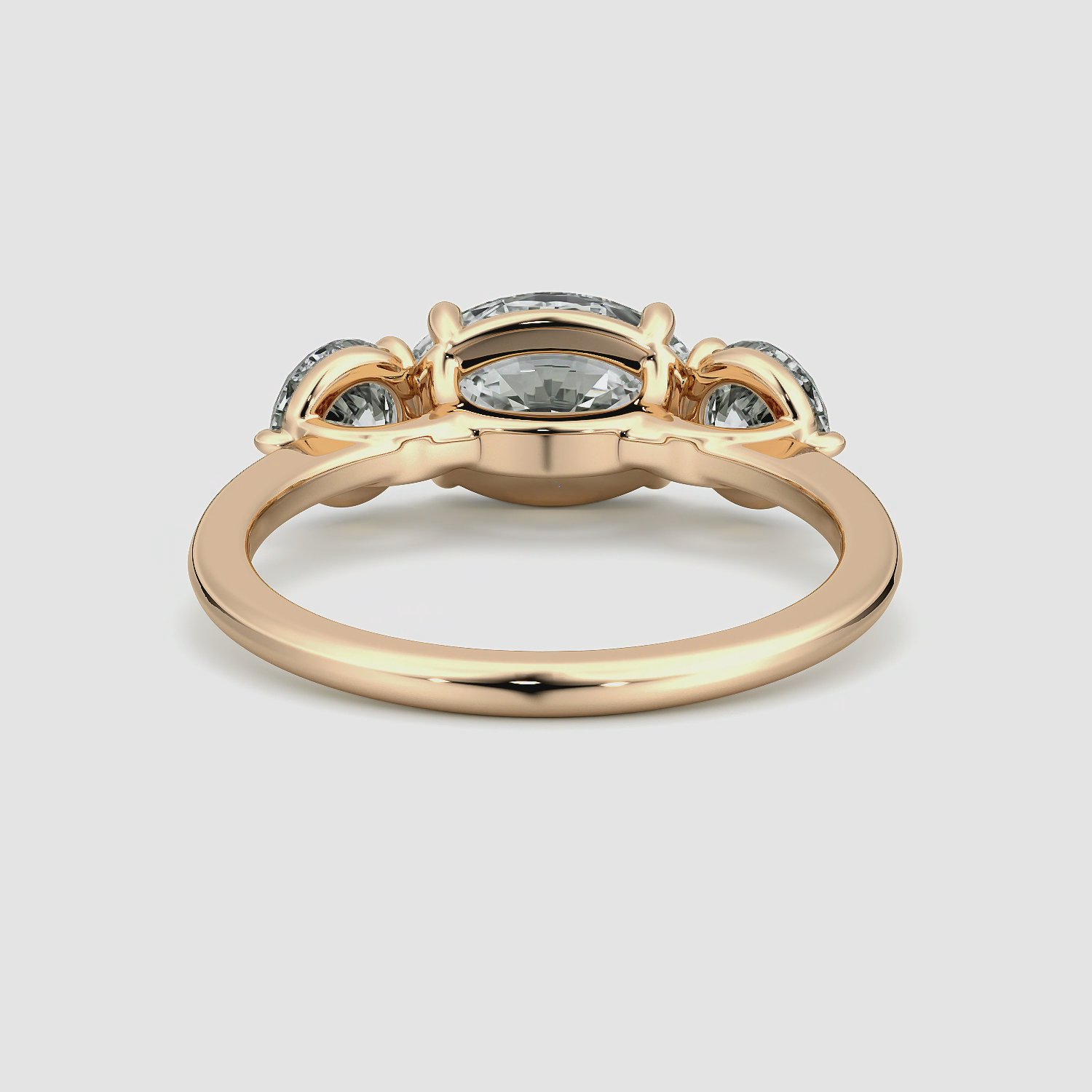 The Three Stone | Oval | 14k | Rose Gold | bandAccent: Plain | diamondOrientation: horizontal | sideStoneCarat: 0.50ct | sideStoneShape: Round Brilliant | caratWeight: other