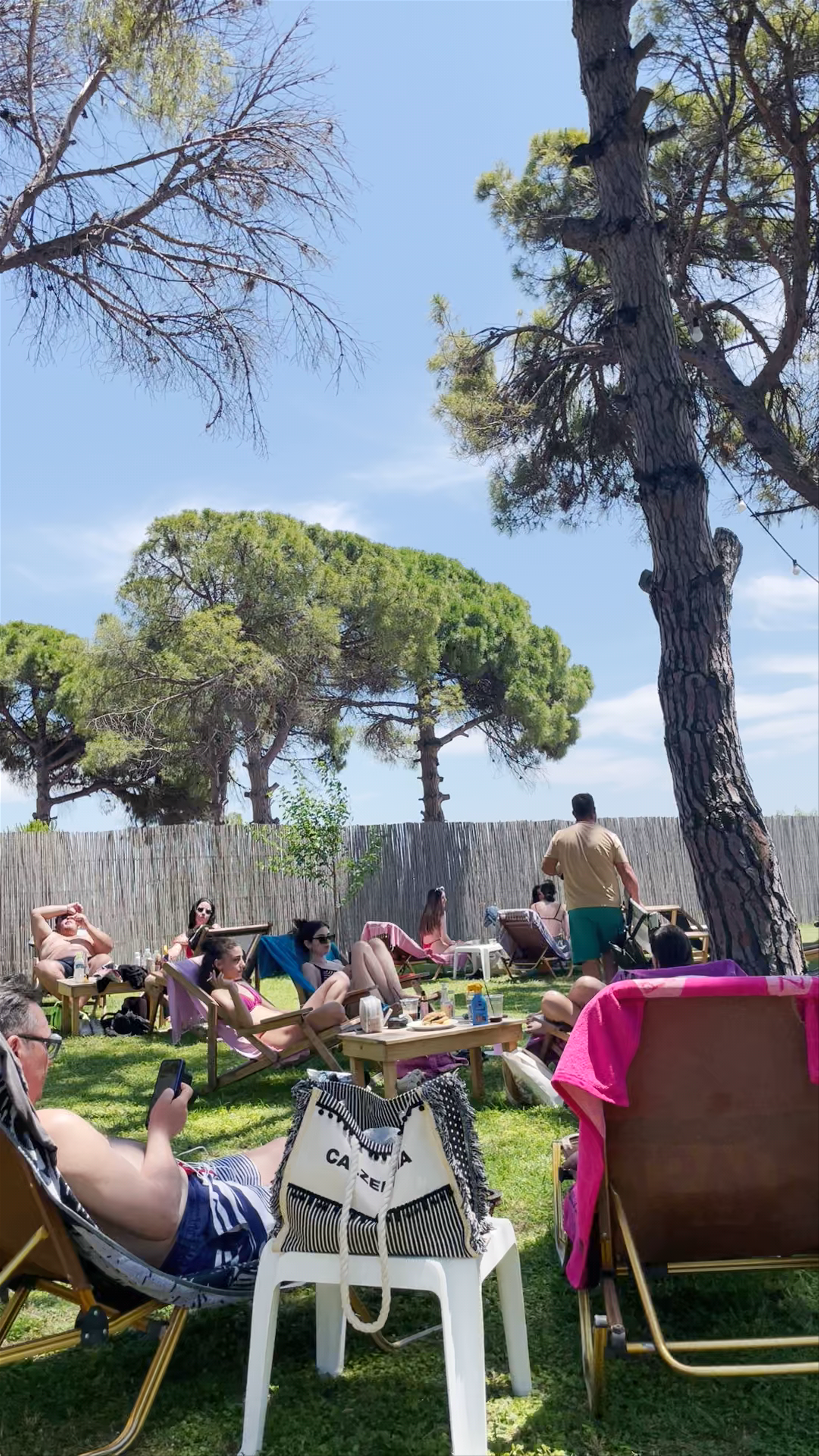 Sun-Drenched Relaxation at Aloha Beach, Nea Kallikratia, Greece