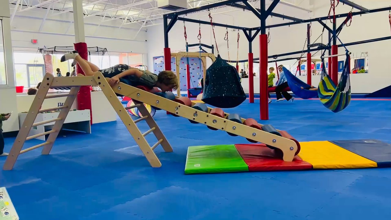 We Rock The Spectrum - All abilities slide.  Maybe don't go down on your belly. - Indoor Playcenter Near Me - Austin, Texas