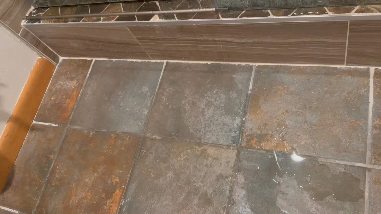 Wheatley Creek Services - Newly installed raised shower platform leaking copious amounts of water onto bathroom floor!!! - Home Cleaning Near Me - Granby, Colorado