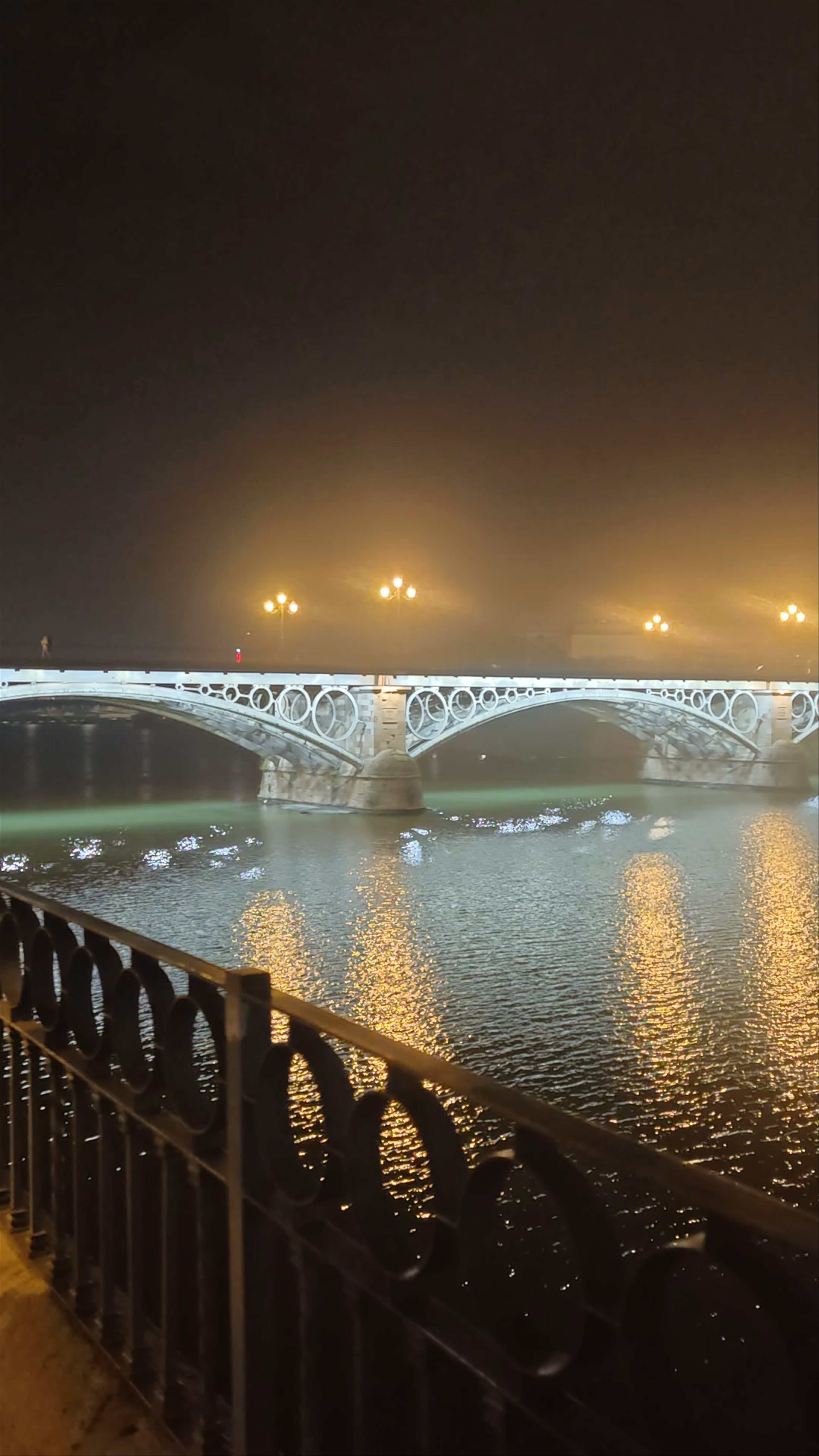 Nighttime Magic at Puente de Isabel II (Puente de Triana) in Seville