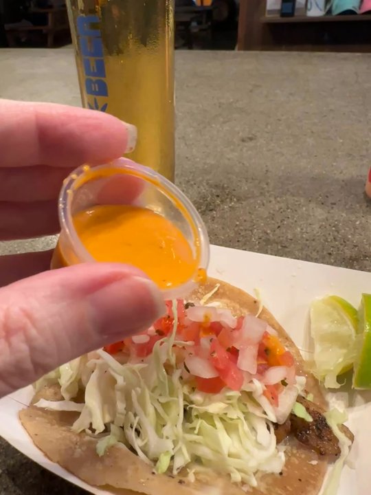 Meche's Fish Tacos - Chipotle sauce on a grilled fish taco. - Food Trucks Near Me - Vista, California