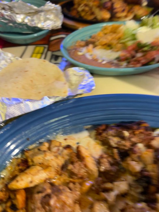 El Patio - Chori Pollo with rice, beans, and some tortillas.  I added a side of sour cream. - Mexican Near Me - Shreveport, Louisiana