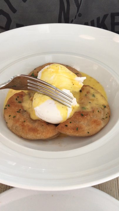 The Nash - Duck Confit Perogies & Poached Eggs....cutting into this was so pretty! - Bars Near Me - Calgary, Alberta