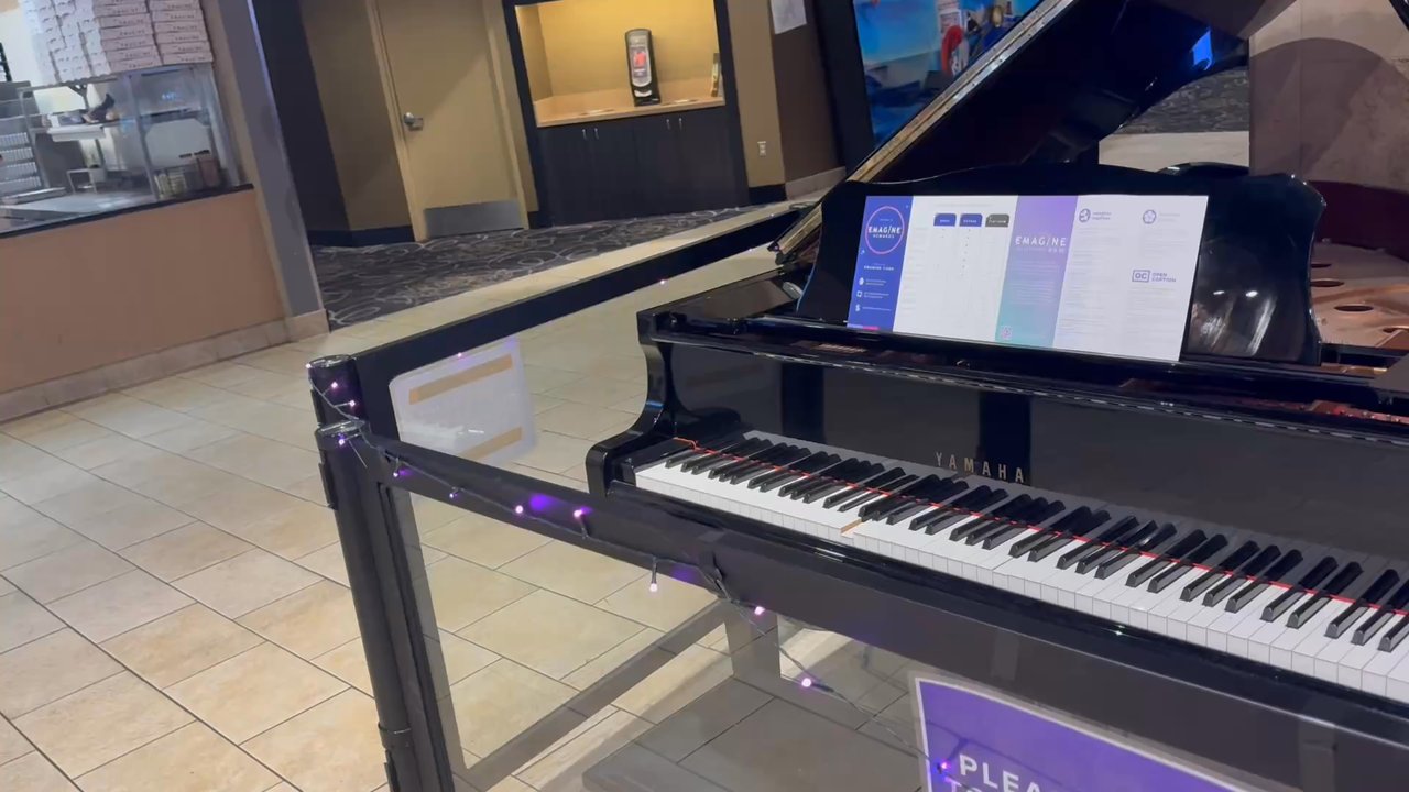 Emagine Macomb - Piano plays itself in the lobby - Cinema Near Me - Macomb, Michigan