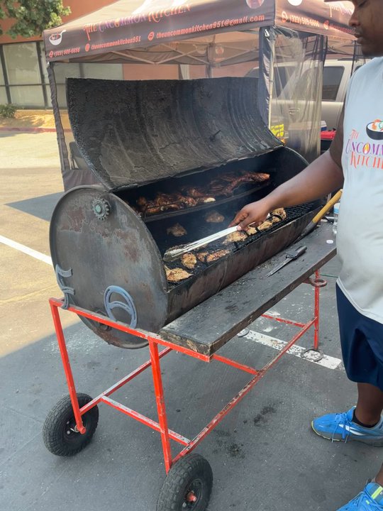 The Uncommon Kitchen - I was driving down Bradley just south of McCall and say the tent and these smoking barrels from the road. I had to pull up - Caterers Near Me