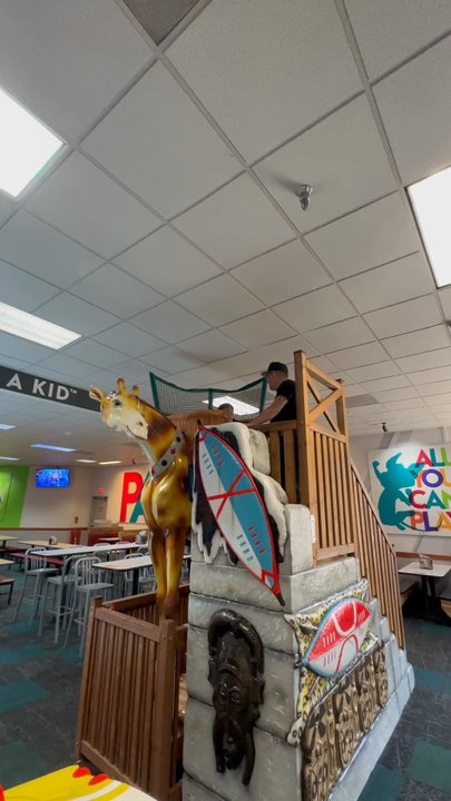 Chuck E. Cheese - Cool giraffe ride - Pizza Near Me - Virginia Beach, Virginia