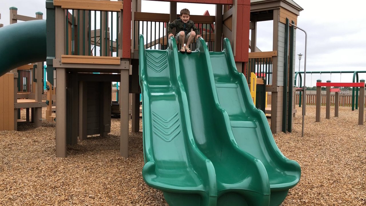 Piedmont Community Park - 3 different slides in one. Boy is on high speed--it's steep but short enough to not be too scary or dangerous. - Playgrounds Near Me - Piedmont, Oklahoma