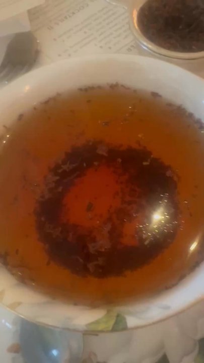 The Raleigh Room - A cup full of undrinkable tea - Cocktail Bars Near Me - Virginia Beach, Virginia