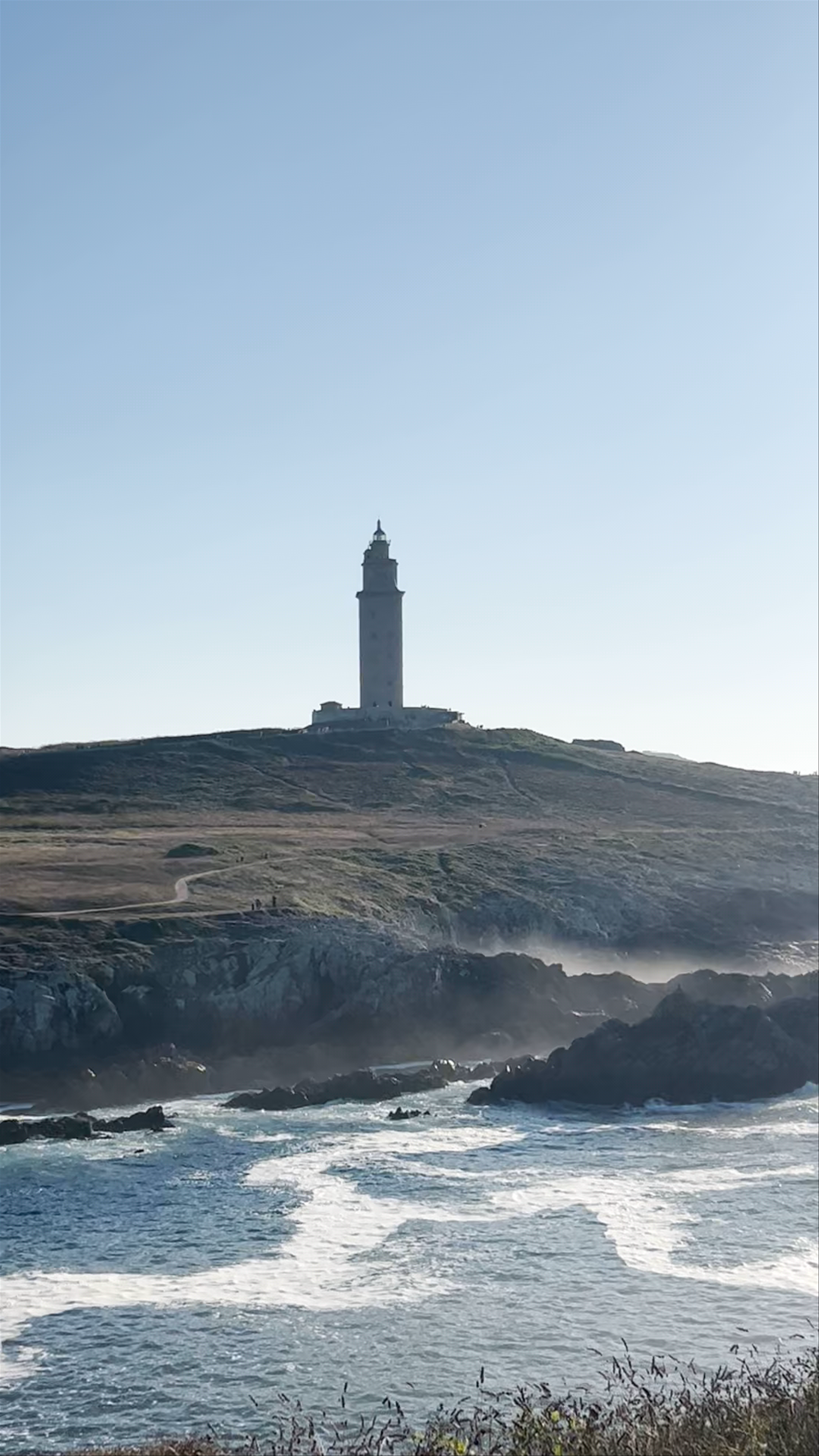 Torre de Hércules at Sunset: Majestic Coastal Lighthouse in A Coruña