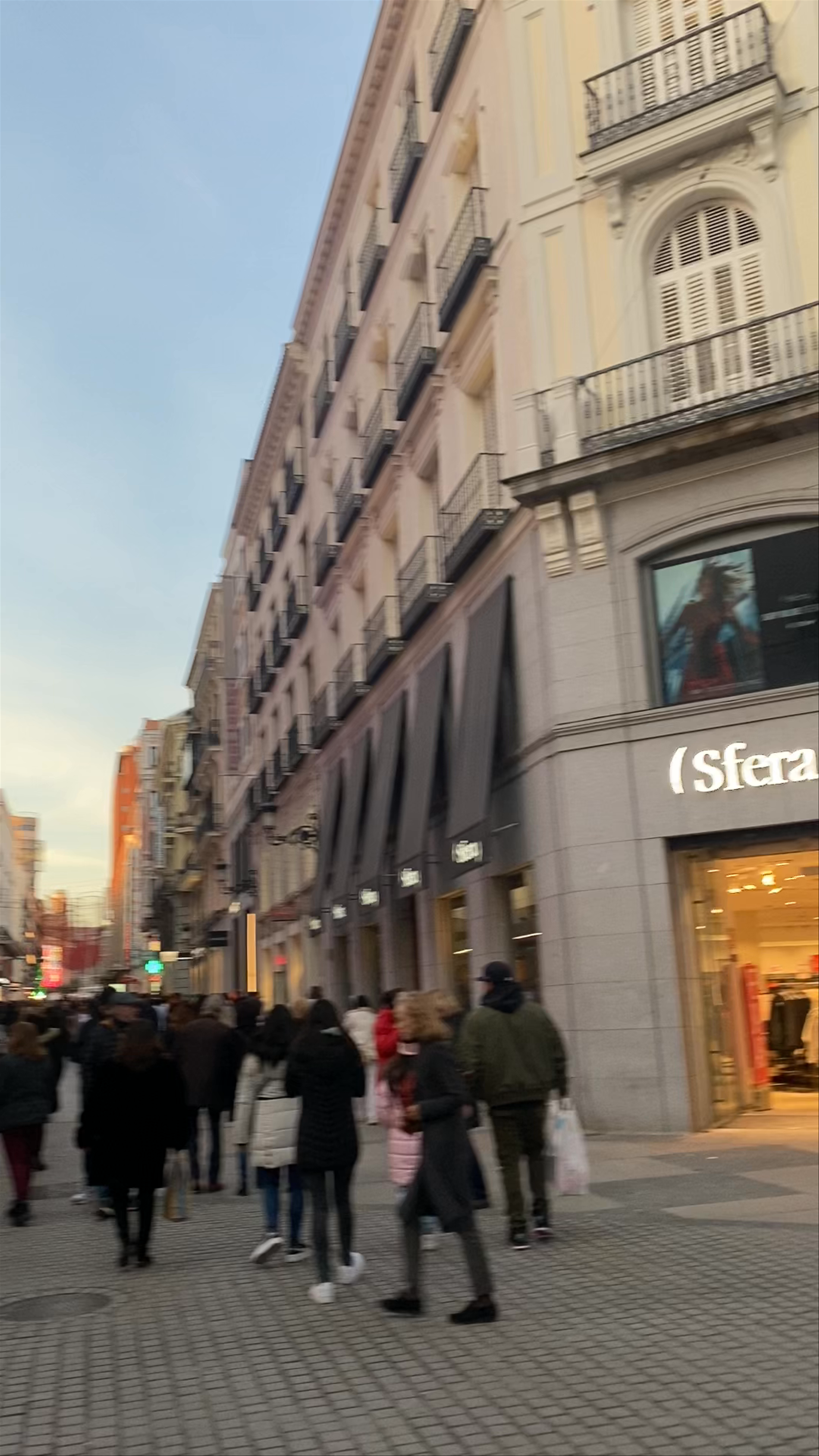 Vibrant Shopping and Festive Streetscape at Corte Inglés, Madrid