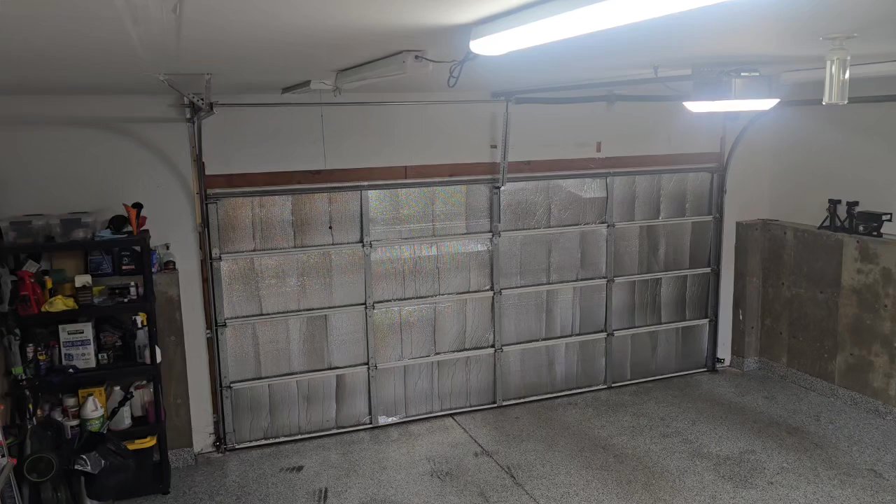 Garage Genius - Door opening nearly flush to the ceiling clearing all the lights. - Garage Door Services Near Me