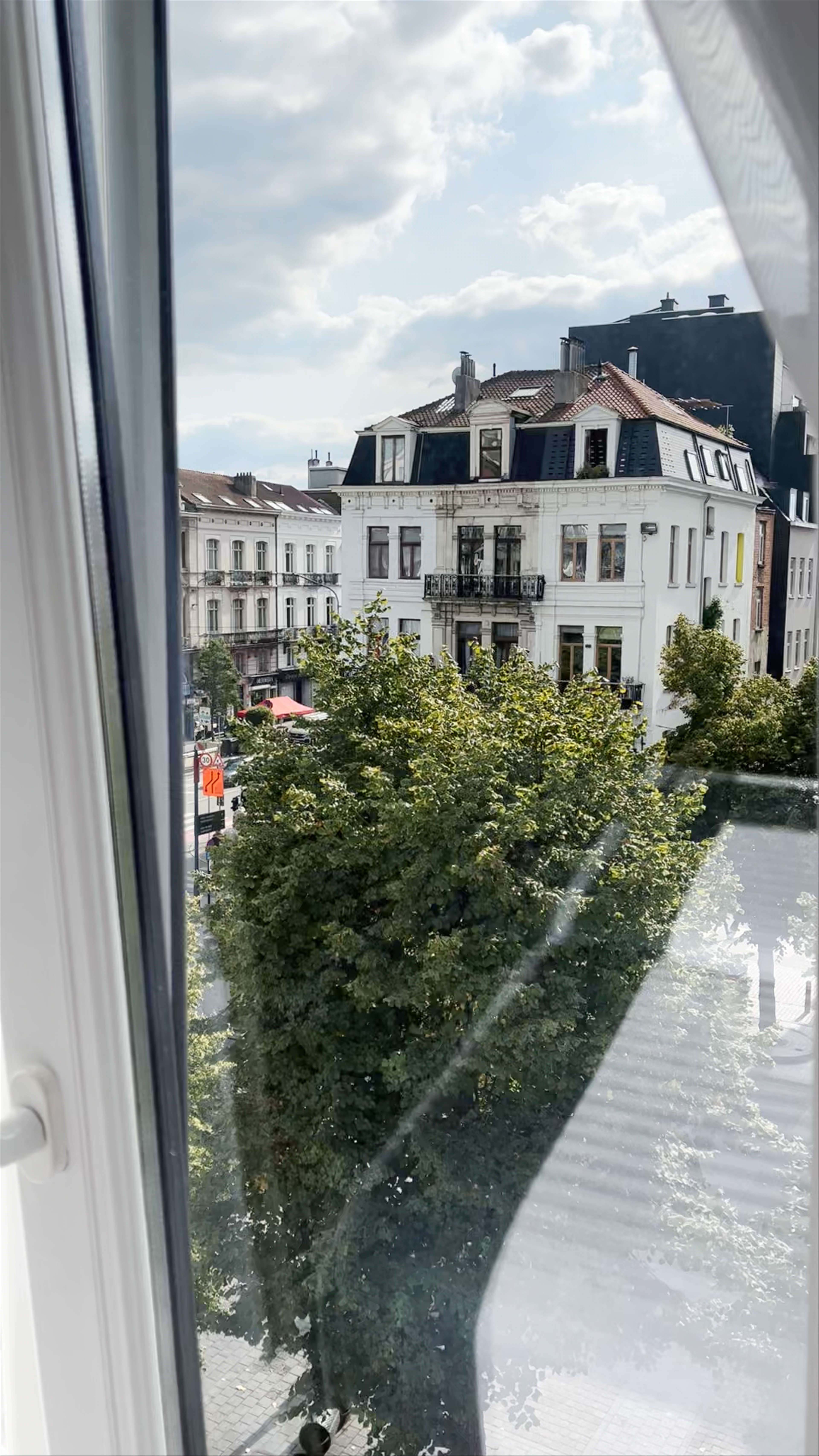 Sunlit Boutique Stay with Classic Brussels Views