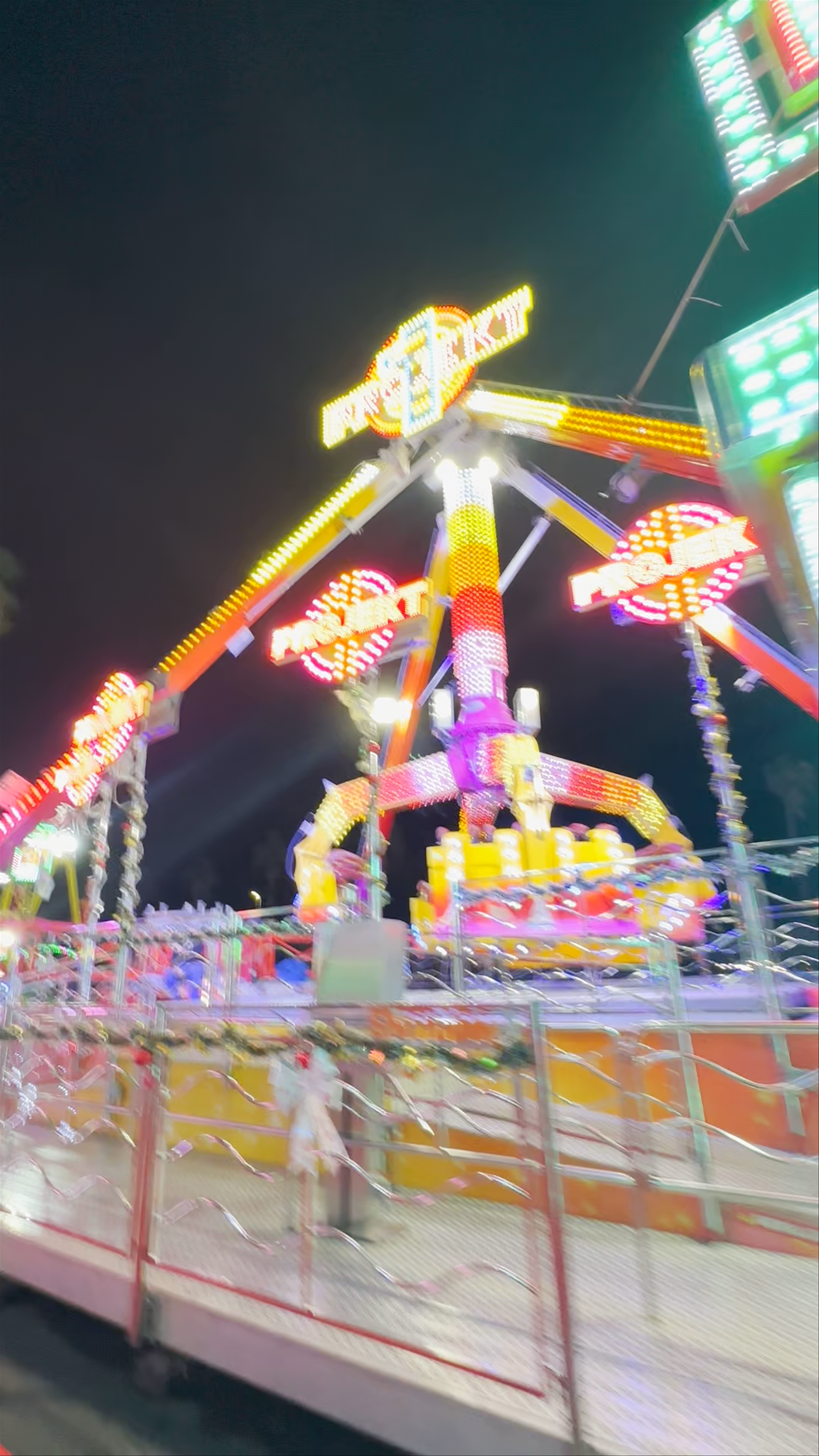 Nighttime Carnival Magic at Paseo Marítimo Santa Catalina, Las Palmas de Gran Canaria