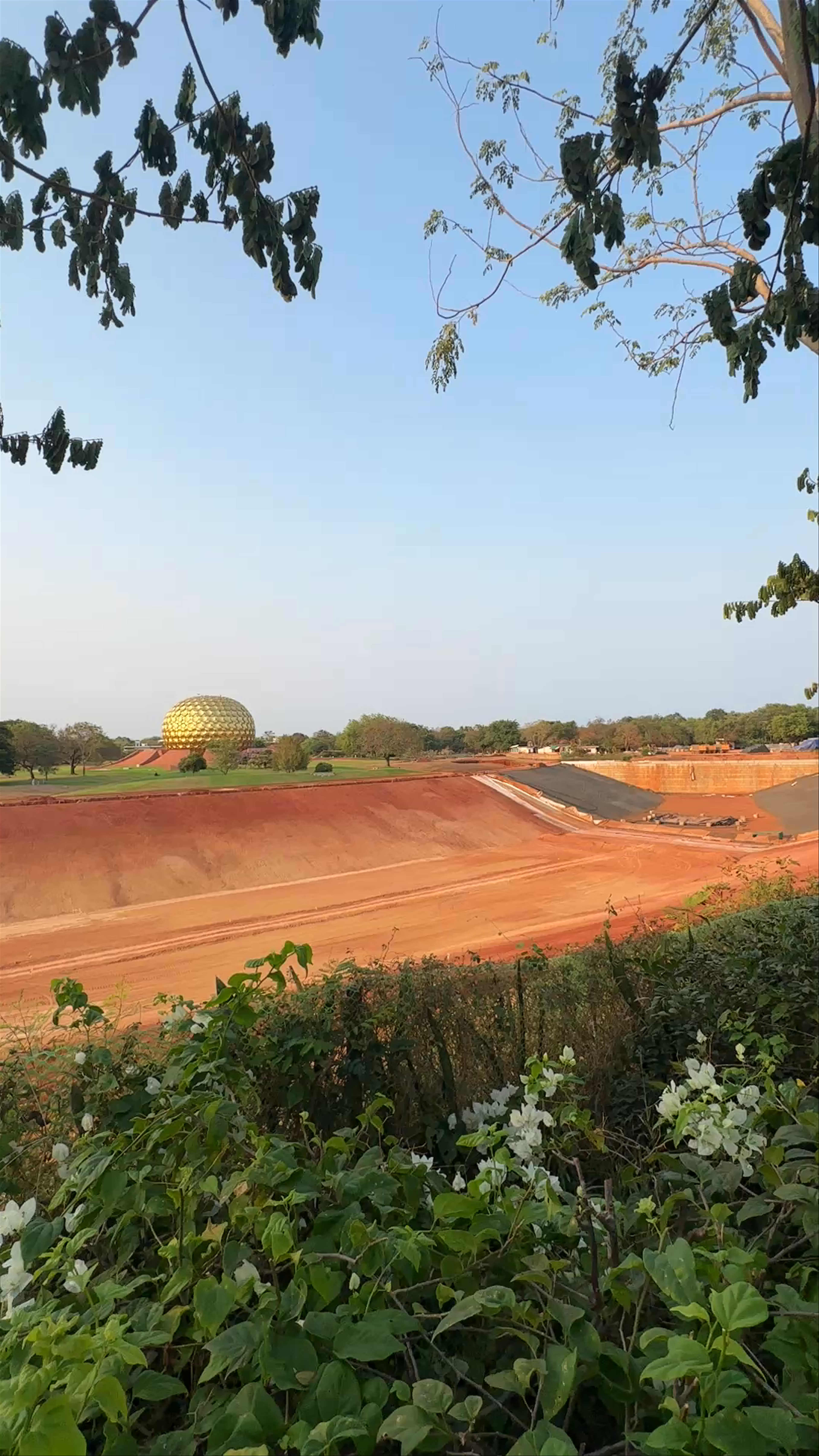Matrimandir at Auroville: Golden Sphere in Serene Tamil Nadu Landscape