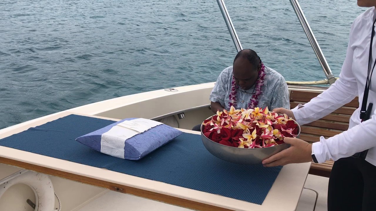 PCK Nautical - We brought the ash in a water-soluble box. The crew prepared flower petals in a ceremonial bowl. - Boat Charters Near Me - Honolulu, Hawaii