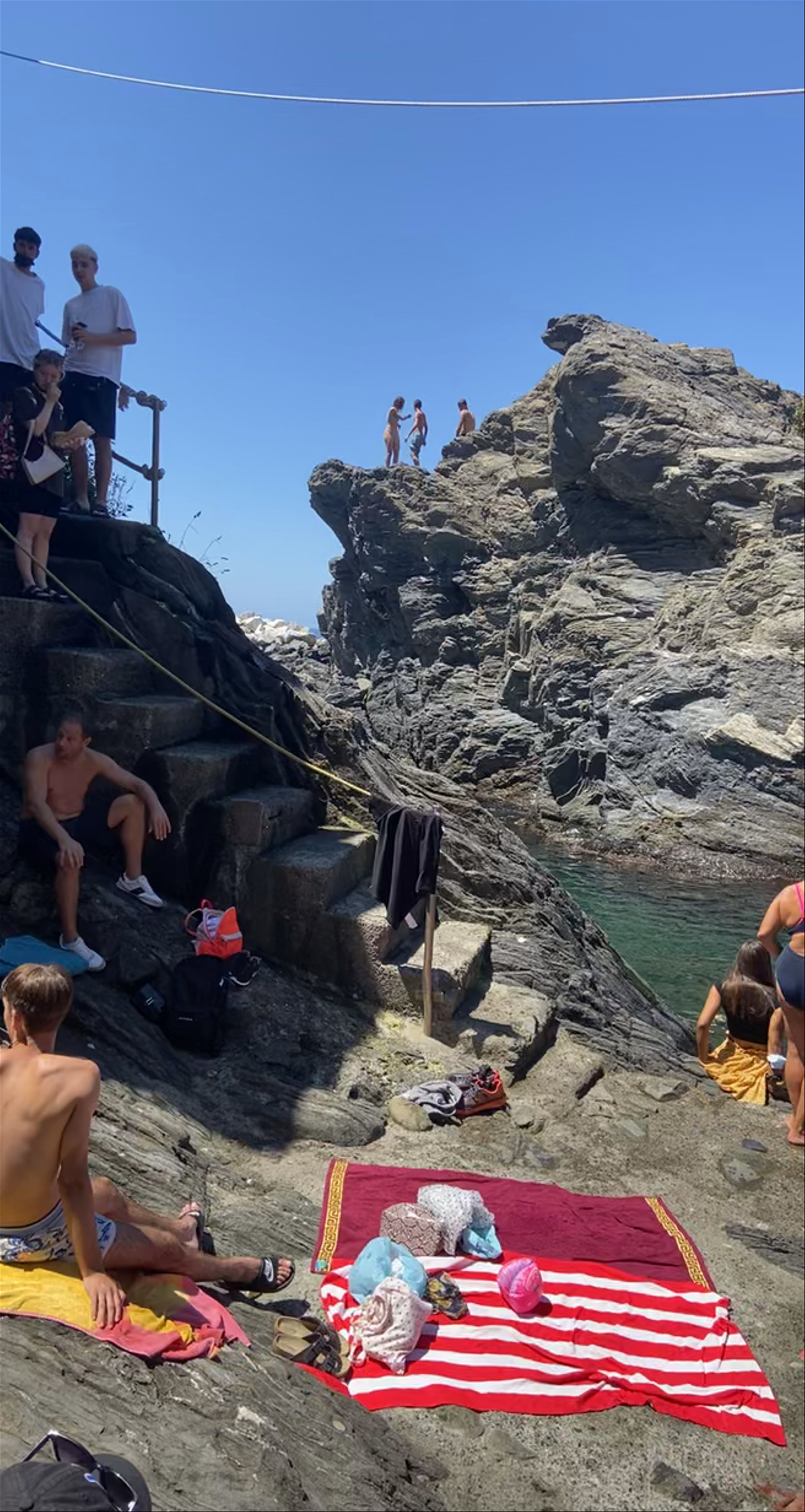Sun-Soaked Cliffside Swimming and Cliff Diving in Manarola, Italy
