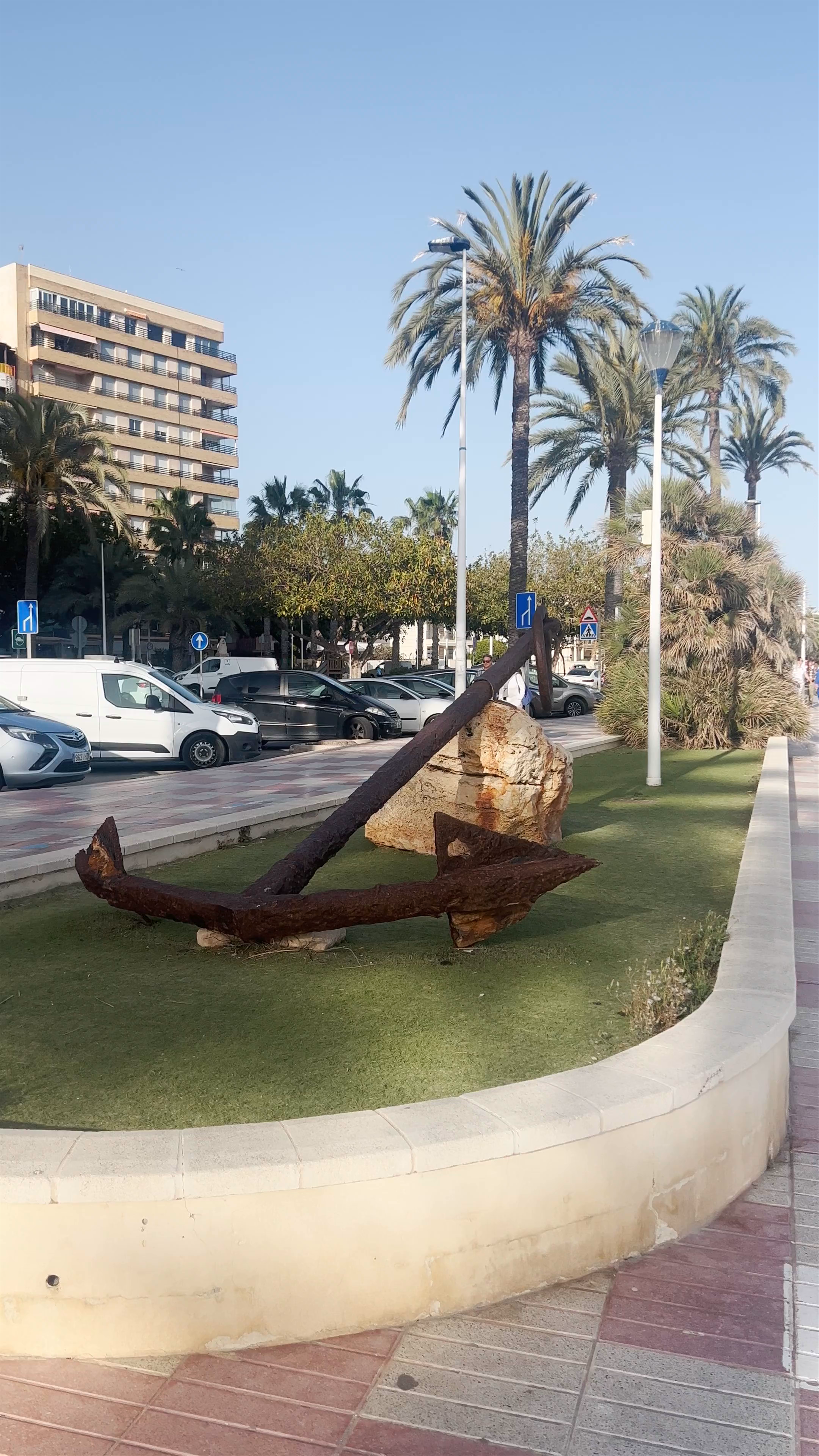 Sunny Coastal Stroll at Playa de Santa Pola, Spain