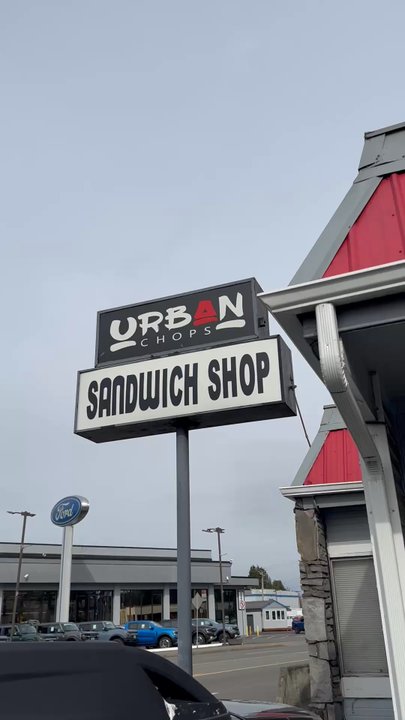 Urban Chops - Outside with a sign - Vietnamese Near Me - Auburn, Washington